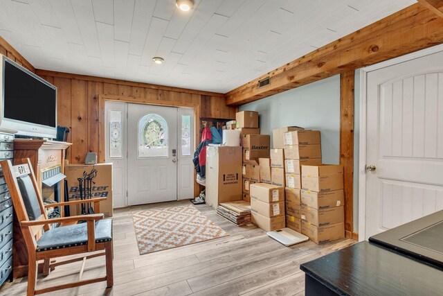 2729 Heights Circle Rd, Greenbrier, TN 37073 - foyer entrance with light wood-type flooring and wooden walls