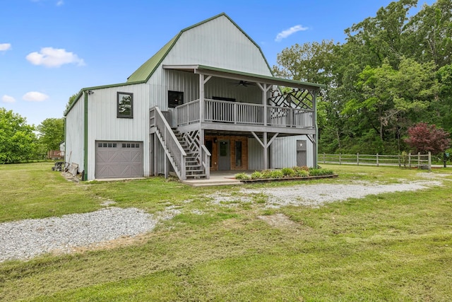 210 S 3rd St, Dickson, TN 37055 - view of front facade with ceiling fan, a wooden deck, stairs, and driveway