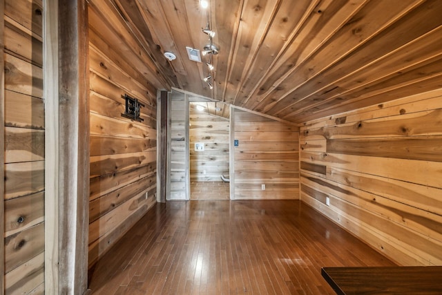 210 S 3rd St, Dickson, TN 37055 - spare room featuring lofted ceiling, wood walls, dark wood-type flooring, and wood ceiling