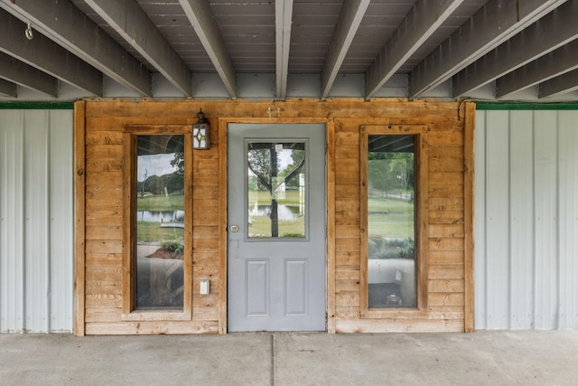 210 S 3rd St, Dickson, TN 37055 - doorway to property featuring board and batten siding