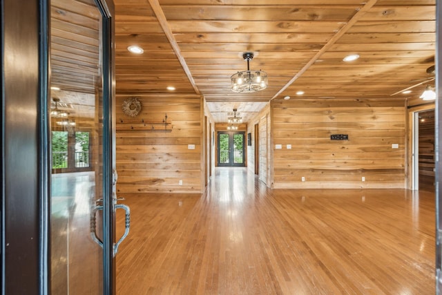 210 S 3rd St, Dickson, TN 37055 - unfurnished living room featuring wooden ceiling, wooden walls, wood finished floors, recessed lighting, and a chandelier