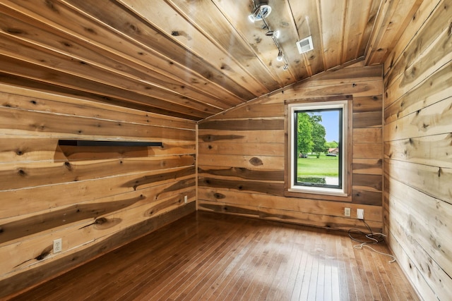 210 S 3rd St, Dickson, TN 37055 - bonus room with lofted ceiling, wooden walls, dark wood-style floors, and wooden ceiling