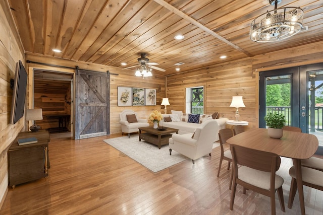 210 S 3rd St, Dickson, TN 37055 - living area featuring a barn door, wooden ceiling, wooden walls, wood finished floors, and recessed lighting