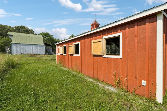 210 S 3rd St, Dickson, TN 37055 - view of property exterior with board and batten siding