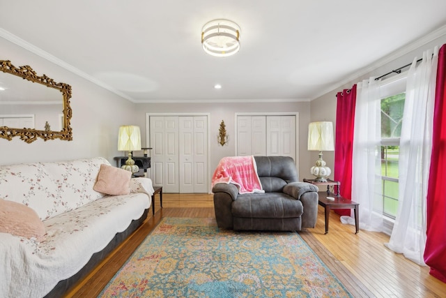 1106 5th Ave, Lawrenceburg, TN 38464 - living room with hardwood / wood-style flooring, crown molding, and recessed lighting