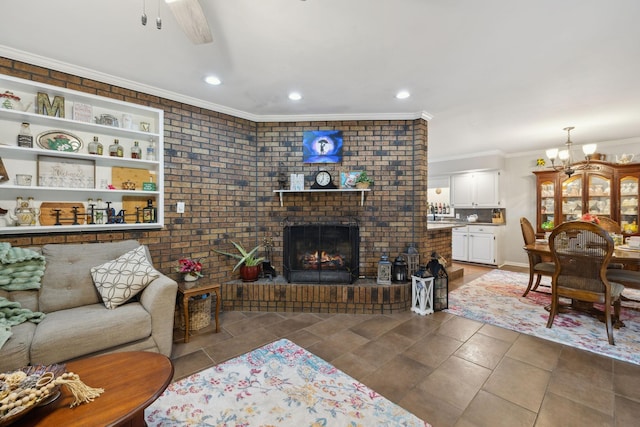 1106 5th Ave, Lawrenceburg, TN 38464 - living room featuring ornamental molding, a fireplace, recessed lighting, a chandelier, and a ceiling fan