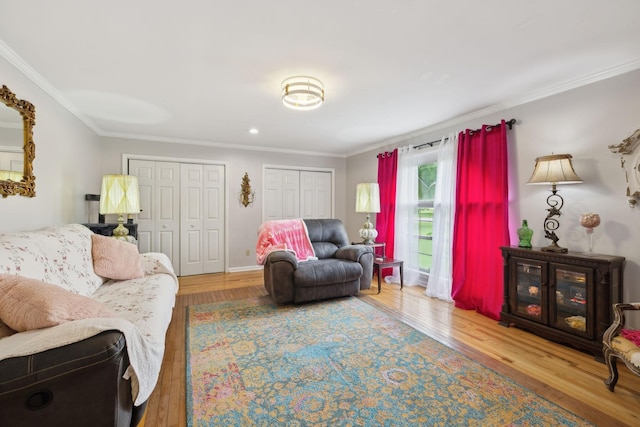 1106 5th Ave, Lawrenceburg, TN 38464 - living room with ornamental molding, wood finished floors, and baseboards