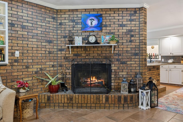 1106 5th Ave, Lawrenceburg, TN 38464 - living room featuring crown molding, tile patterned flooring, and a brick fireplace