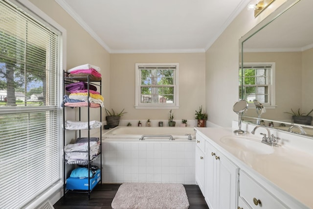 1106 5th Ave, Lawrenceburg, TN 38464 - full bathroom with vanity, healthy amount of natural light, a bath, wood finished floors, and ornamental molding