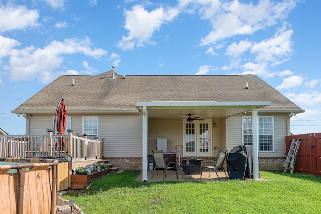 409 Princeton Dr, Lebanon, TN 37087 - rear view of house featuring a patio area, a ceiling fan, a vegetable garden, and a shingled roof