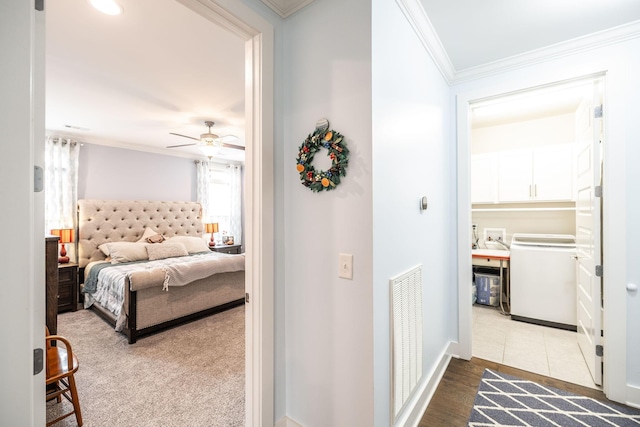 1039 Laffite Way, Gallatin, TN 37066 - bedroom featuring washer / dryer, crown molding, and a ceiling fan