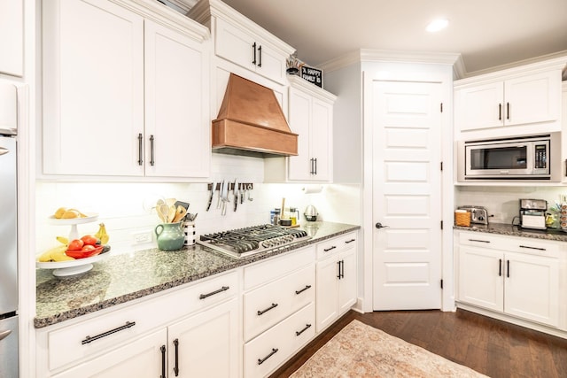 1039 Laffite Way, Gallatin, TN 37066 - kitchen featuring custom range hood, stainless steel appliances, tasteful backsplash, light stone counters, and dark wood-style flooring