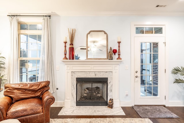 1039 Laffite Way, Gallatin, TN 37066 - living room featuring wood finished floors, crown molding, baseboards, and a fireplace