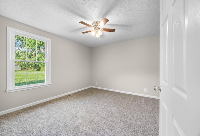 517 Overton Dr, Clarksville, TN 37042 - unfurnished room with ceiling fan, carpet, baseboards, and a textured ceiling