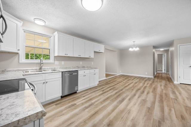 517 Overton Dr, Clarksville, TN 37042 - kitchen with dishwasher, a sink, white cabinetry, light wood finished floors, and a chandelier