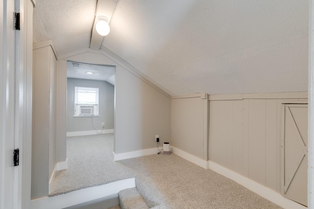 158 W Hite St, Gallatin, TN 37066 - bonus room featuring a textured ceiling, vaulted ceiling, carpet flooring, cooling unit, and baseboards