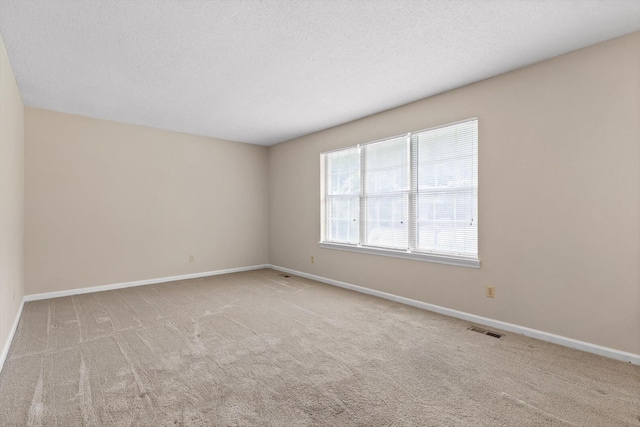 3554 Mountain Creek Rd, Chattanooga, TN 37415 - carpeted spare room with baseboards and a textured ceiling