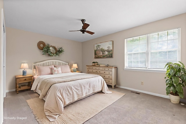 3554 Mountain Creek Rd, Chattanooga, TN 37415 - bedroom featuring baseboards, light colored carpet, and a ceiling fan