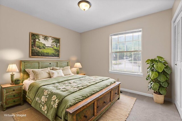 3554 Mountain Creek Rd, Chattanooga, TN 37415 - bedroom featuring light carpet, baseboards, and a closet