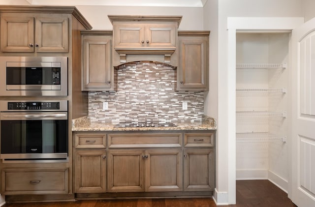 1130 Escalade Ct, Lascassas, TN 37085 - kitchen with stainless steel appliances, tasteful backsplash, baseboards, light stone countertops, and dark wood-style floors