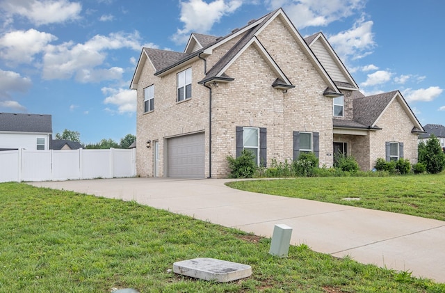 1130 Escalade Ct, Lascassas, TN 37085 - view of home's exterior featuring driveway, a garage, brick siding, and roof with shingles