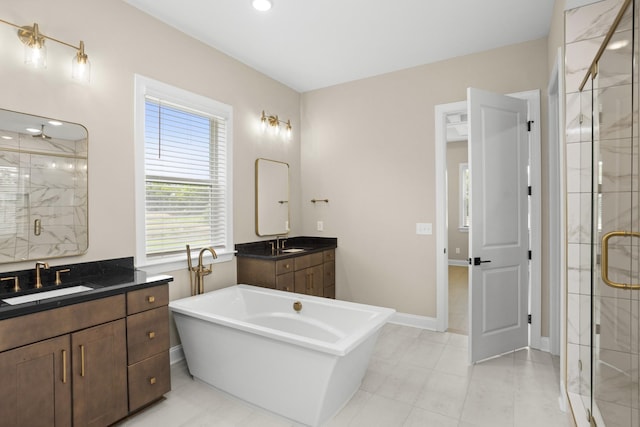 5971 Hunt Valley Dr, Spring Hill, TN 37174 - full bath with a stall shower, two vanities, a soaking tub, and tile patterned floors