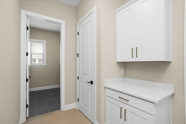 5971 Hunt Valley Dr, Spring Hill, TN 37174 - hall with light wood finished floors and baseboards