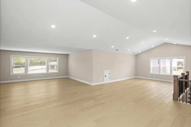 5971 Hunt Valley Dr, Spring Hill, TN 37174 - unfurnished living room featuring light wood-style floors, recessed lighting, and lofted ceiling