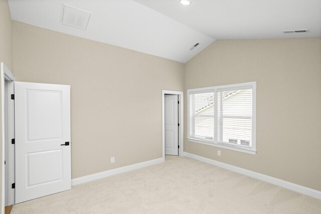 5971 Hunt Valley Dr, Spring Hill, TN 37174 - unfurnished bedroom with light colored carpet and vaulted ceiling