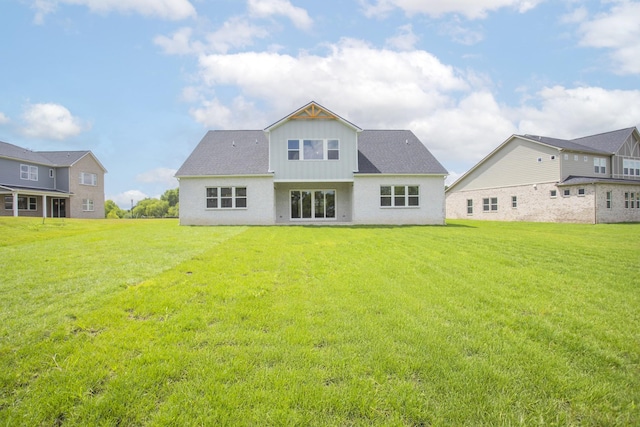 5971 Hunt Valley Dr, Spring Hill, TN 37174 - back of house featuring board and batten siding and a yard