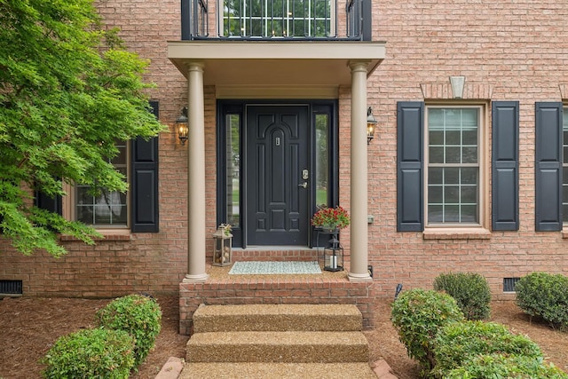 625 Ploughmans Bend Dr, Franklin, TN 37064 - doorway to property with brick siding and a balcony