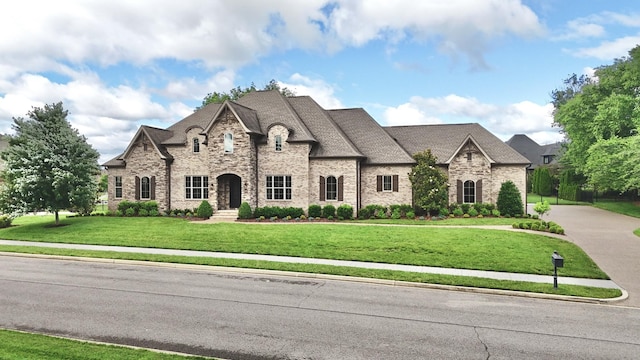 1266 Potter Ln, Gallatin, TN 37066 - french provincial home featuring a front lawn and stone siding