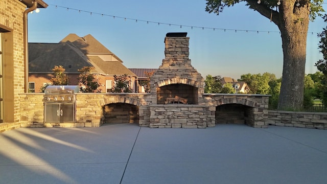 1266 Potter Ln, Gallatin, TN 37066 - view of patio featuring an outdoor stone fireplace