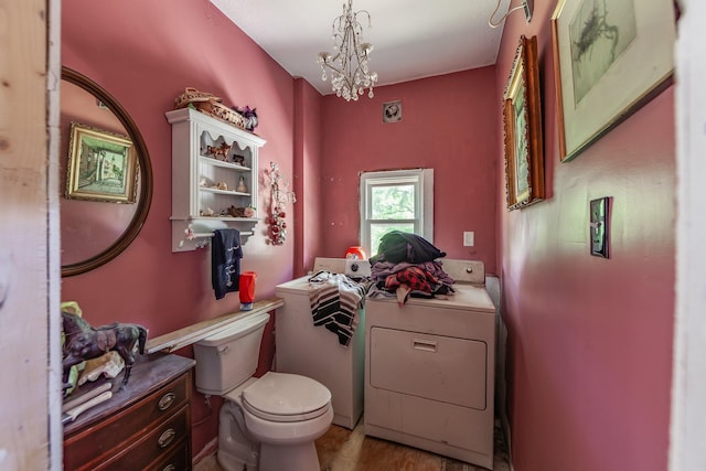 3396 Unionville Rd, Halls, TN 38040 - bathroom featuring toilet and a chandelier
