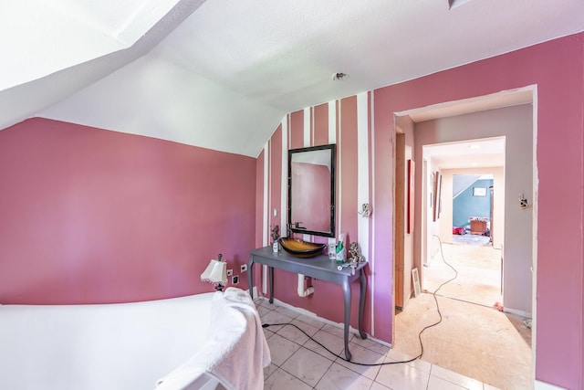 3396 Unionville Rd, Halls, TN 38040 - bedroom featuring lofted ceiling and light tile patterned floors