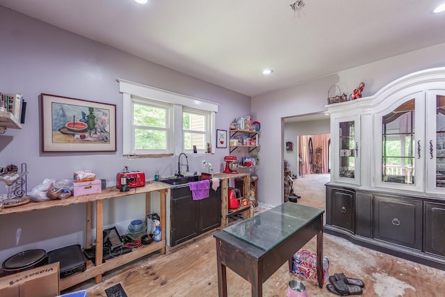 3396 Unionville Rd, Halls, TN 38040 - home office with a sink, recessed lighting, and light wood finished floors