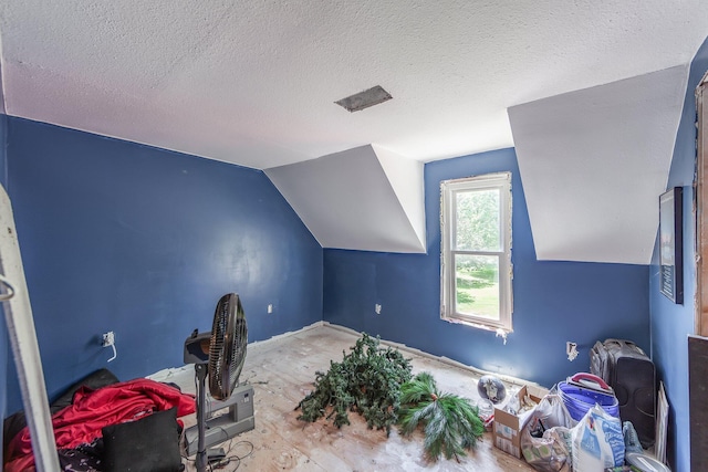3396 Unionville Rd, Halls, TN 38040 - office area with vaulted ceiling, a textured ceiling, and baseboards