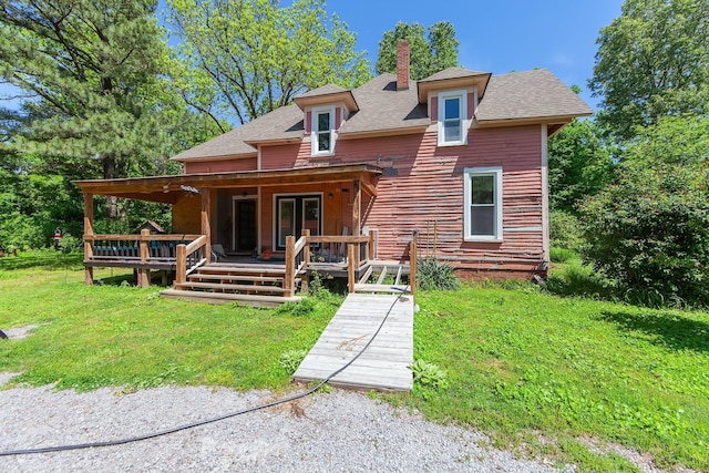 3396 Unionville Rd, Halls, TN 38040 - view of front facade with a chimney, a front lawn, roof with shingles, and a deck
