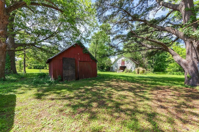 3396 Unionville Rd, Halls, TN 38040 - view of green lawn featuring an outdoor structure and a pole building