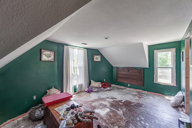 3396 Unionville Rd, Halls, TN 38040 - bonus room featuring a textured ceiling, vaulted ceiling, healthy amount of natural light, and baseboards