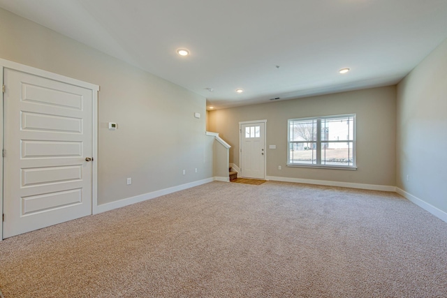 3010 Coriander Dr, Spring Hill, TN 37174 - unfurnished room featuring light carpet, stairs, baseboards, and recessed lighting