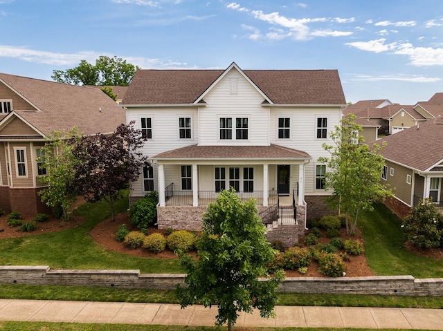 1916 Grace Point Ln, Nolensville, TN 37135 - view of front of house with a porch, a front lawn, and roof with shingles