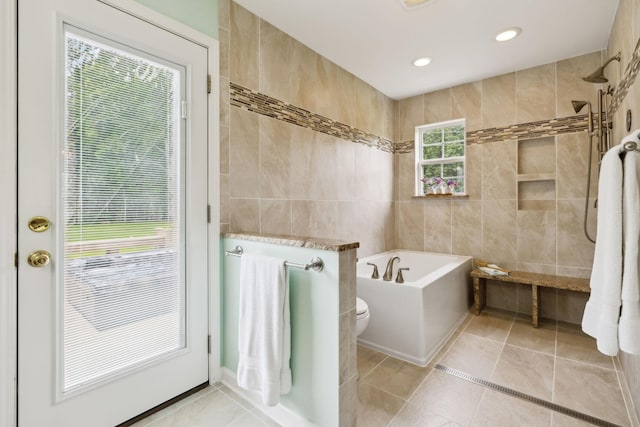 2917 York Rd, Pleasant View, TN 37146 - bathroom with tile walls, a bath, tile patterned floors, a tile shower, and recessed lighting