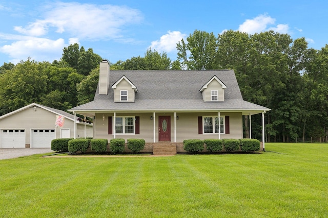 2917 York Rd, Pleasant View, TN 37146 - view of front of house with covered porch, an outbuilding, a garage, a front yard, and a chimney