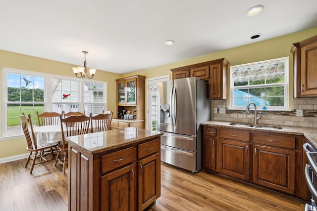 2917 York Rd, Pleasant View, TN 37146 - kitchen with a sink, stainless steel fridge, a chandelier, plenty of natural light, and recessed lighting