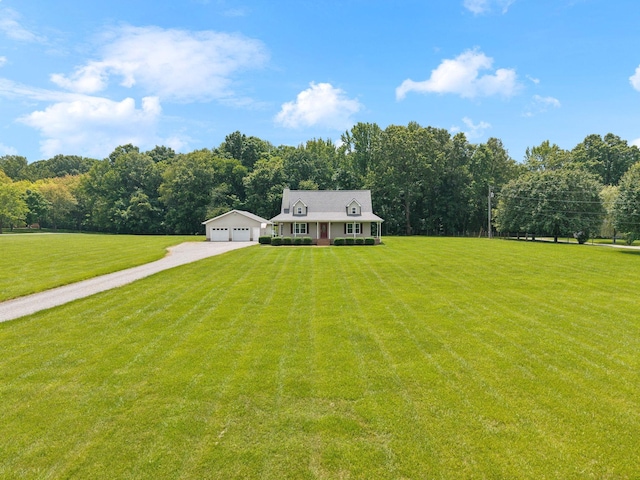 2917 York Rd, Pleasant View, TN 37146 - view of front of home with a front lawn, a wooded view, and driveway
