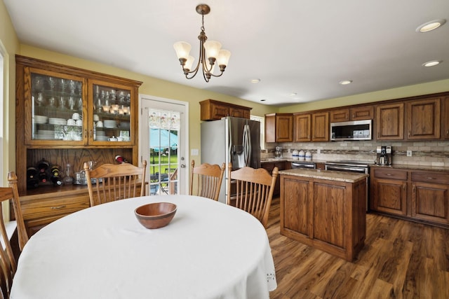 2917 York Rd, Pleasant View, TN 37146 - dining space featuring dark wood-style floors, a chandelier, and recessed lighting