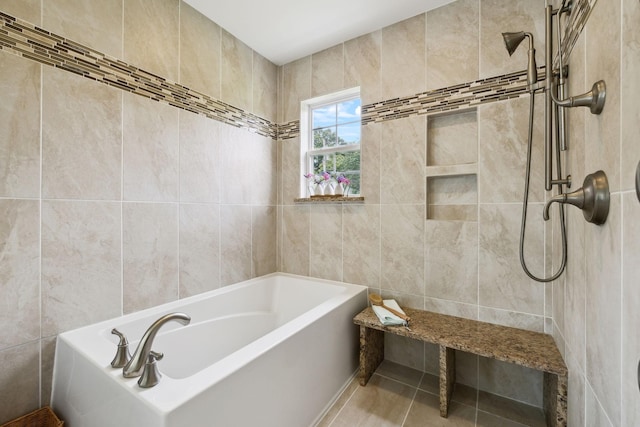 2917 York Rd, Pleasant View, TN 37146 - bathroom with tile walls, a garden tub, and tiled shower