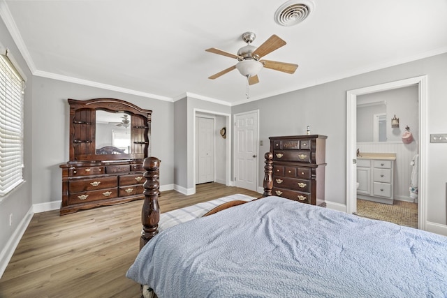 255 Whispering Hills Dr, Dover, TN 37058 - bedroom featuring wood finished floors, crown molding, baseboards, a ceiling fan, and ensuite bathroom