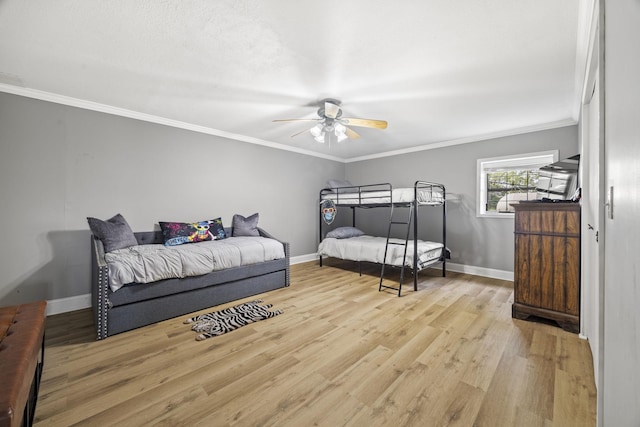 255 Whispering Hills Dr, Dover, TN 37058 - bedroom with light wood-style flooring, baseboards, crown molding, and a ceiling fan